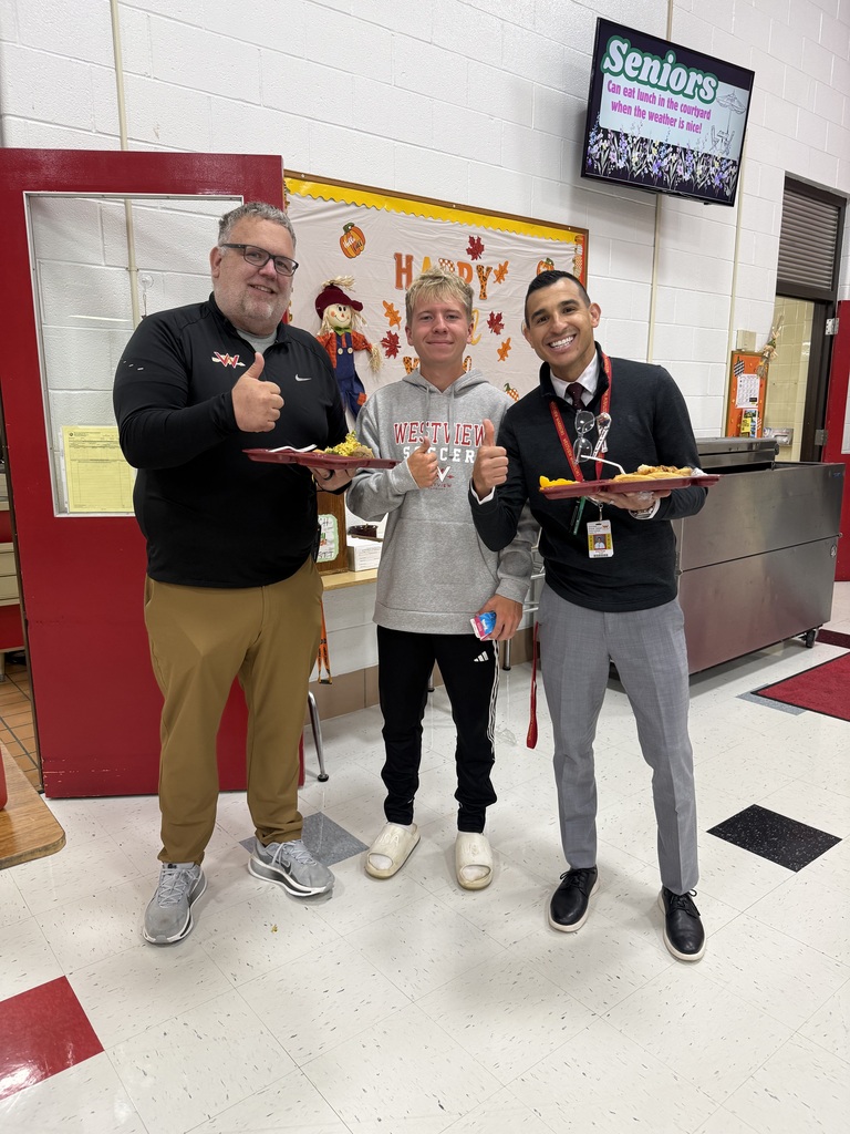 Mr. Bajdek, Carson Niccum and Elias Rojas enjoying the potato bar 9/24/26