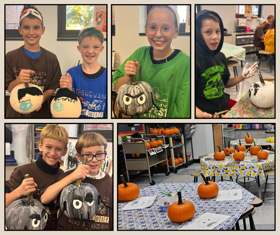 students painting pumpkins