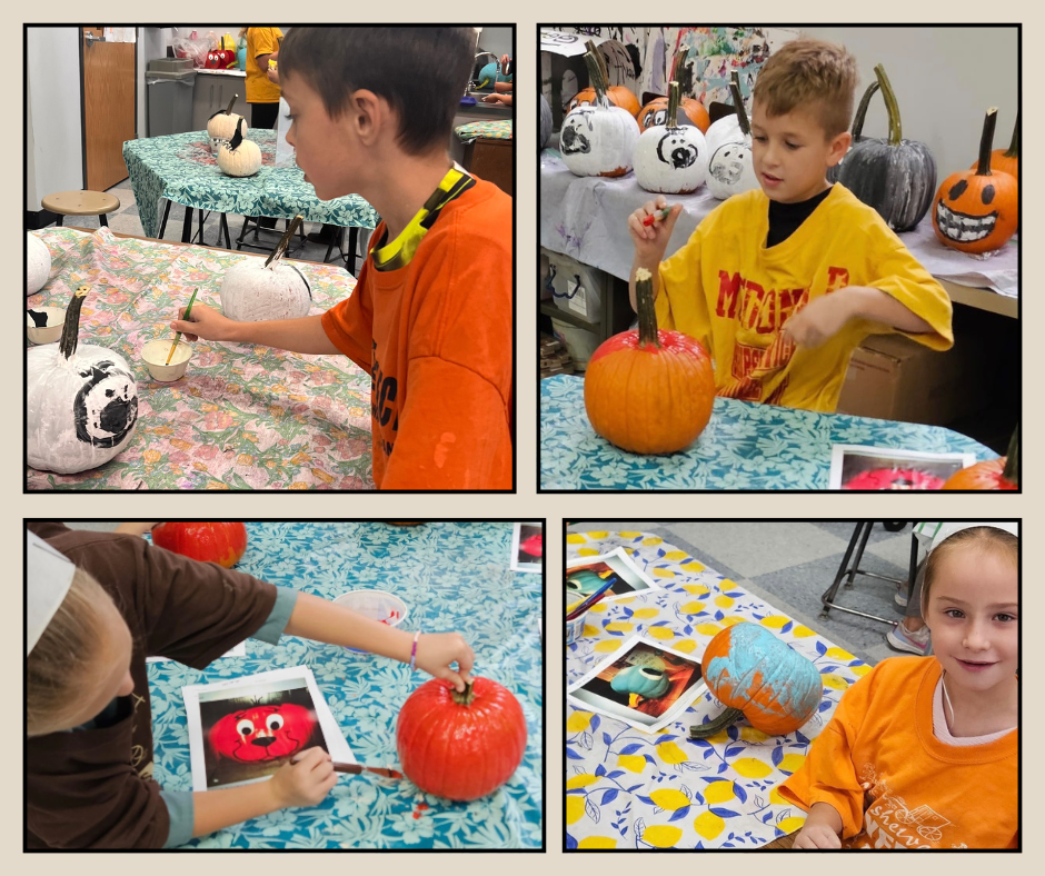 students painting pumpkins