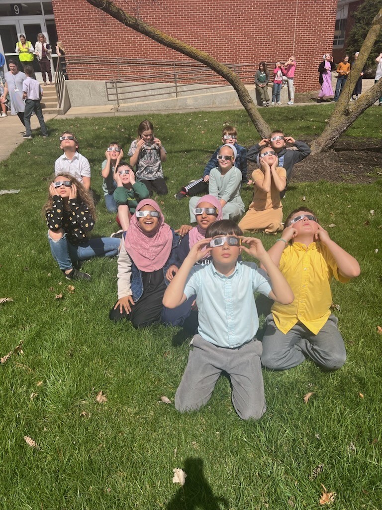 students watching the eclipse