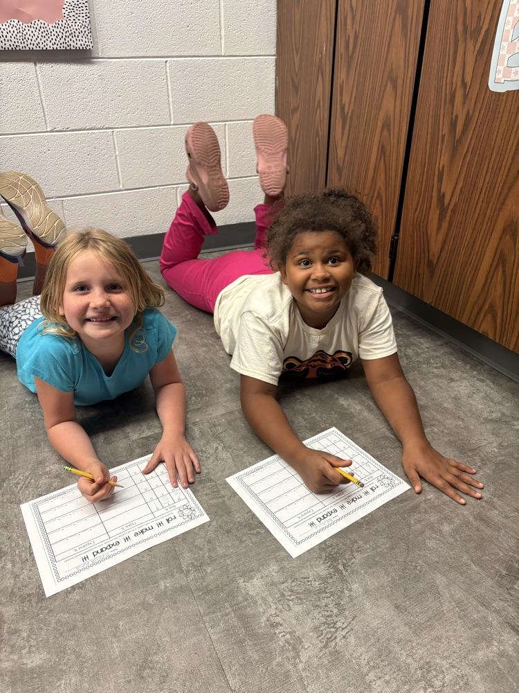 Mrs. Bennettโs second grade friends are working hard during math stations today!