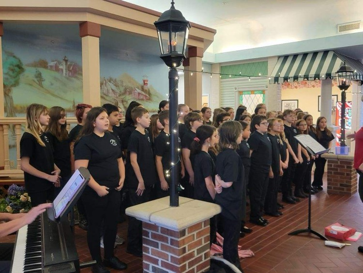 Singing to the Veterans in the crowd