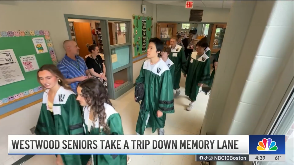 graduates walking the hall on TV