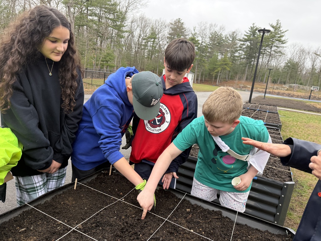 Students planting seeds