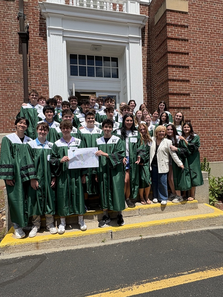Grads outside Sheehan school