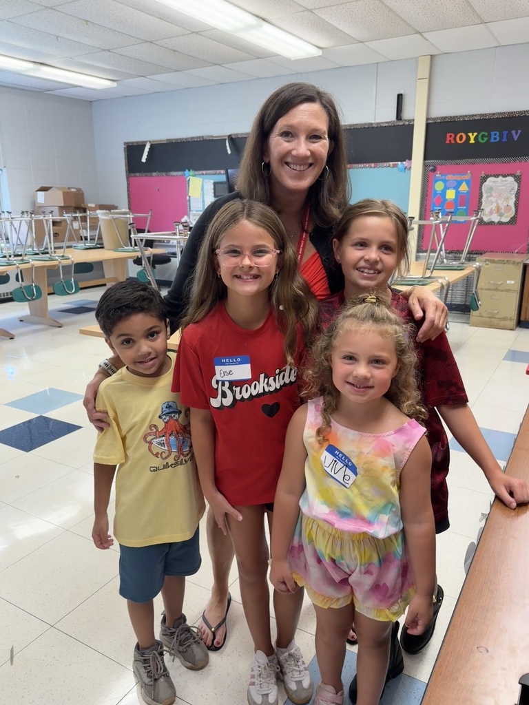 Kindergarten and 5th graders with principal