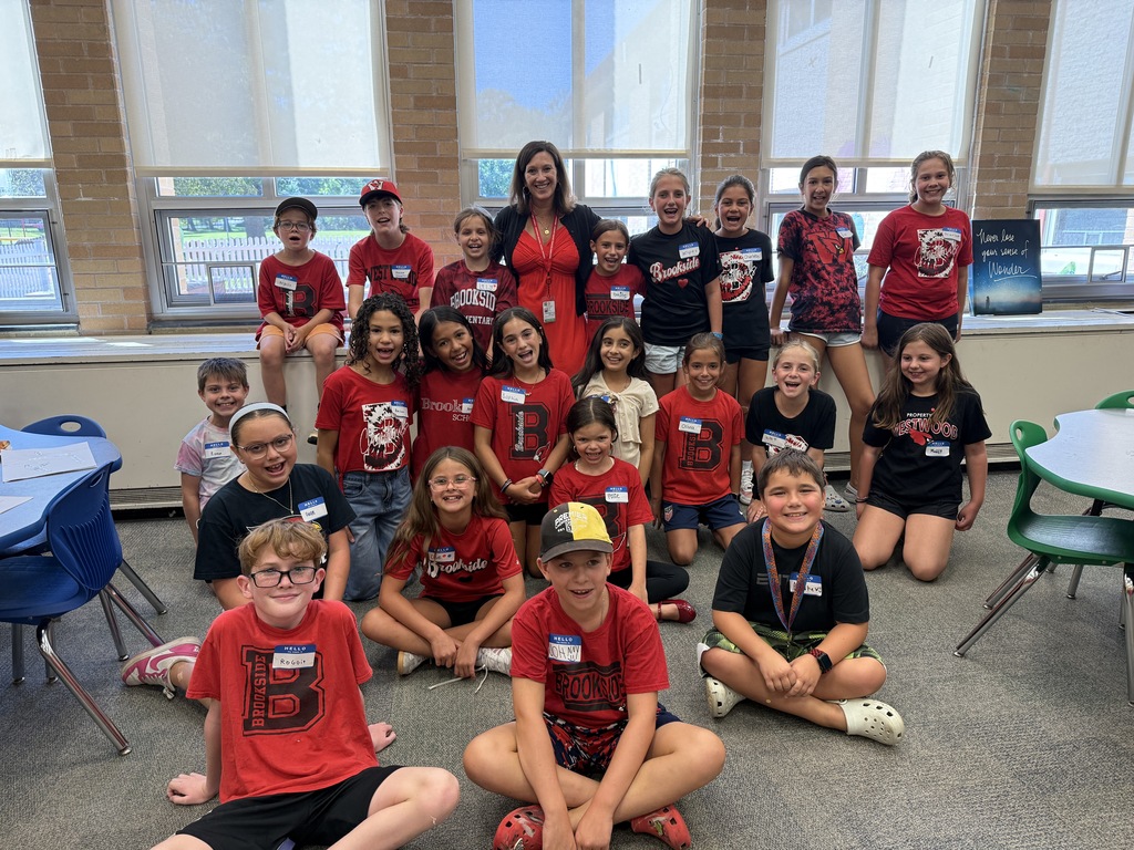 5th graders in red shirts