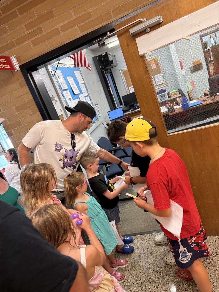5th graders helping K students