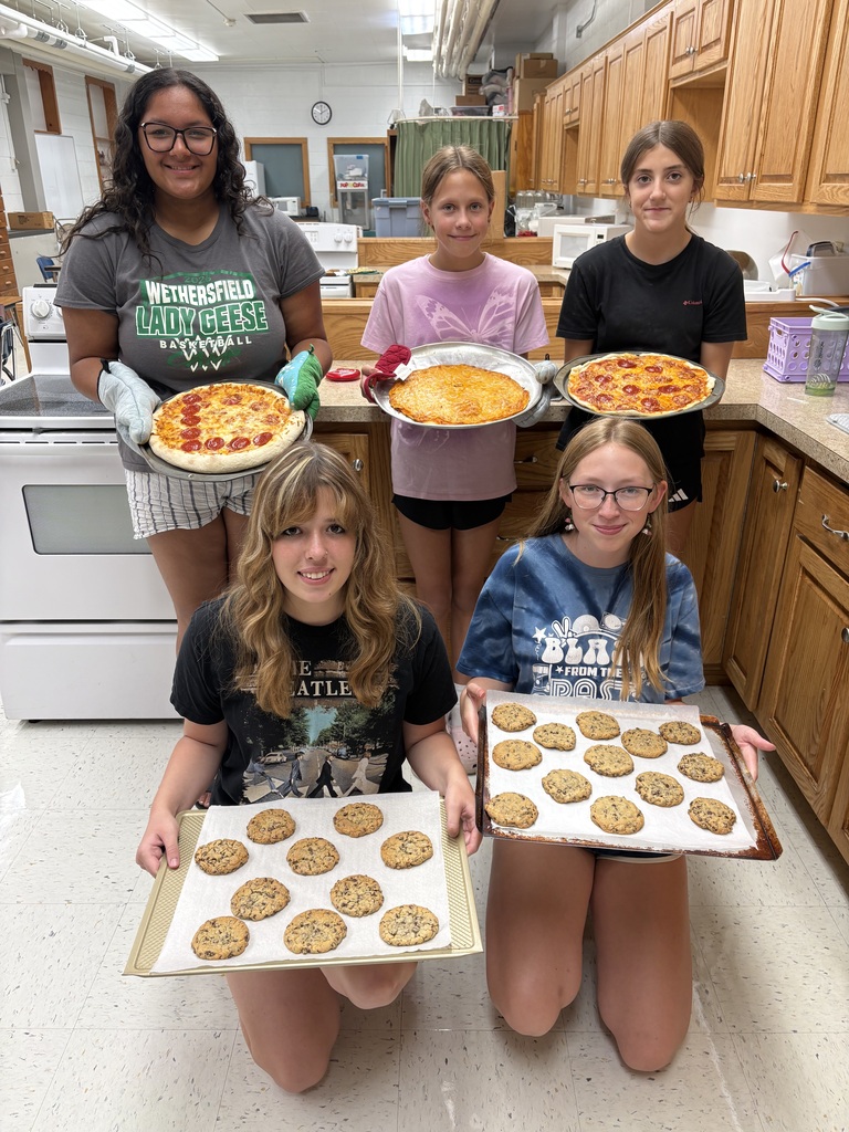 Grub Club Students displaying their food.
