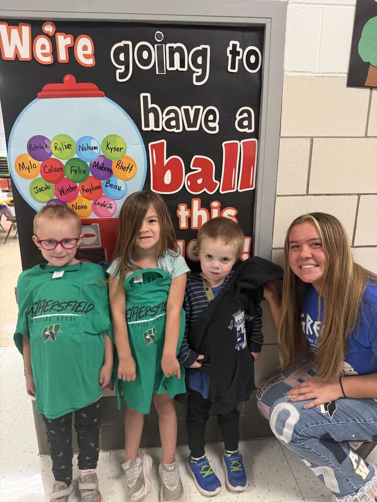 Maddie Verscha delivering spirit wear to elementary students