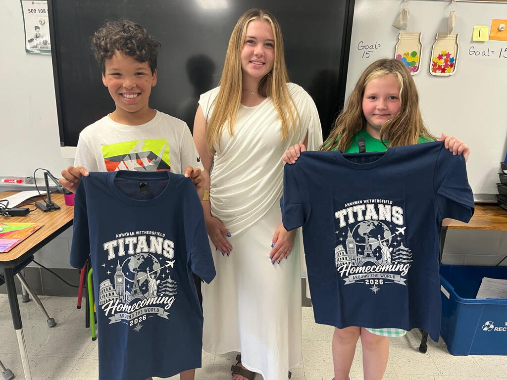 Maddie Verscha delivering spirit wear to elementary students
