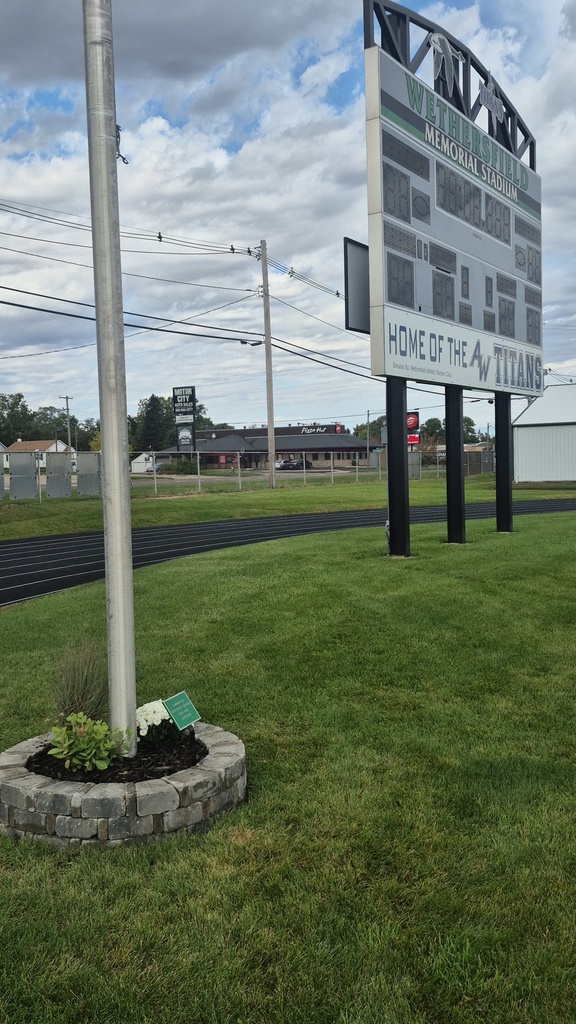 Gustafson Memorial and New A/W Sign