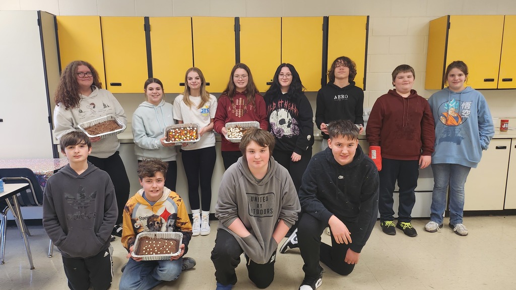 Mrs. Hannah's Discover Your Future class posing with the brownies they made. 