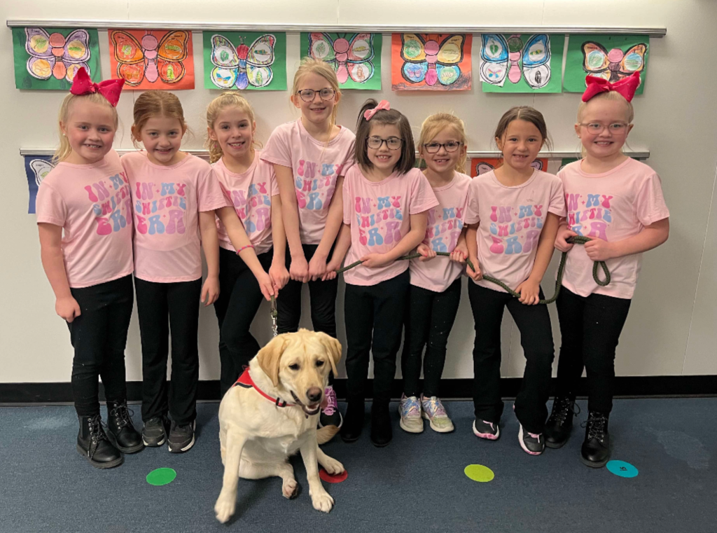Students posing with their twins and Molly for Thing One and Thing Two day. 