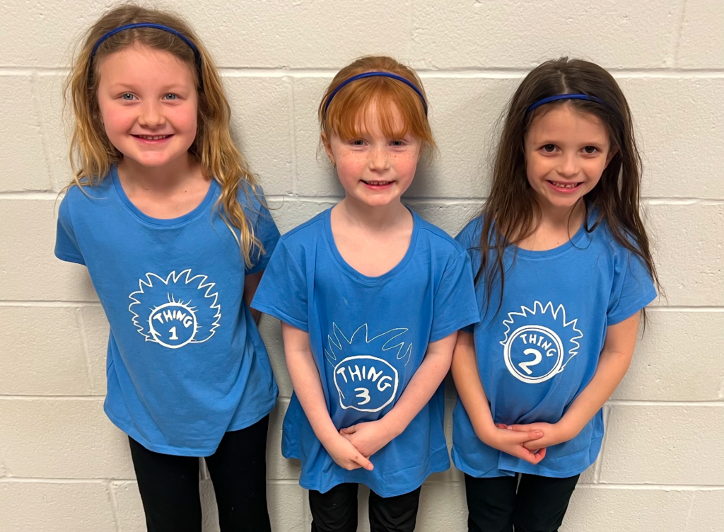 Students posing with their twin for Thing One and Thing Two day. 