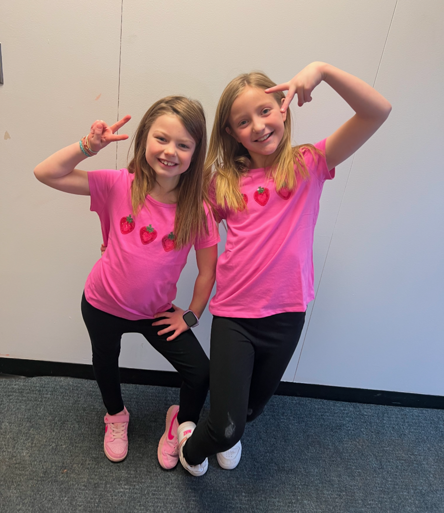 Students posing with their twin for Thing One and Thing Two day. 