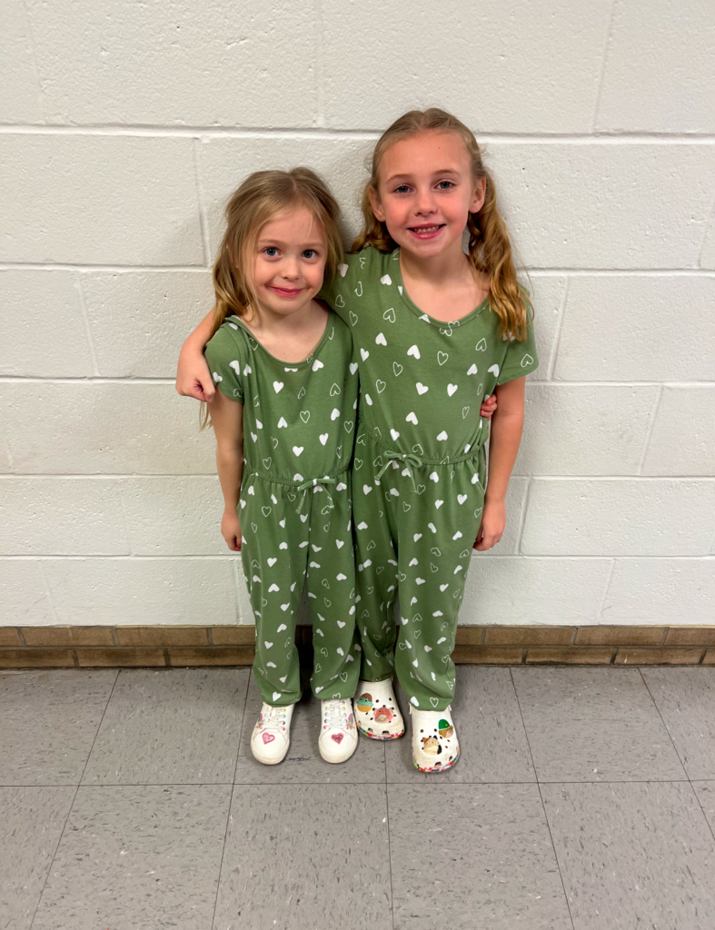 Students posing with their twin for Thing One and Thing Two day. 