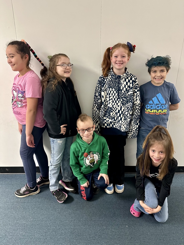A group of students showing off their crazy hair. 