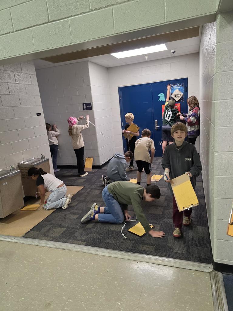 4th graders measuring area and perimeter. 