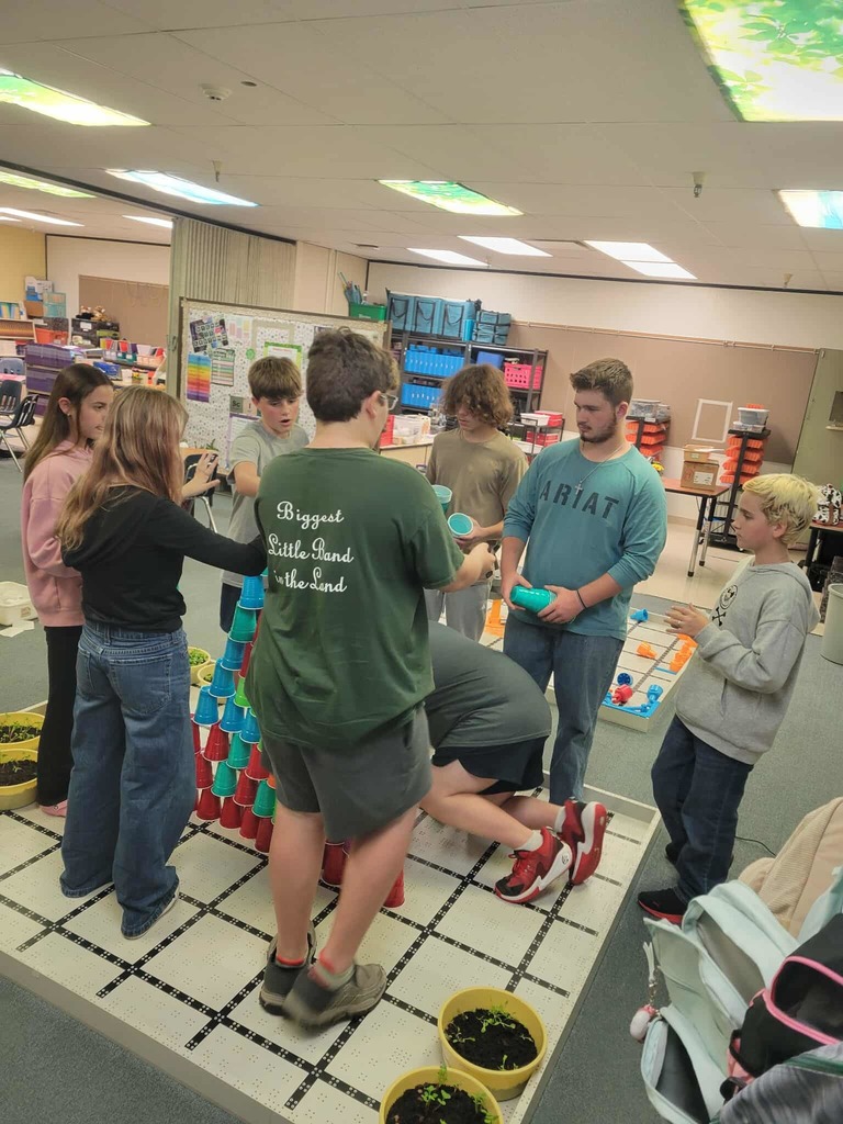 Friday in Leader in me the students focused on Habit 6: Synergize. They discussed how drivers in a team help move a project forward, while restrainers keep the team from being effective. Our Leader in Me class worked as a team to build a tower, without restrainers. By working as drivers and keeping an open line of communication, the group was able to build a tall tower of cups. The students work well as a team and enjoyed the experience.