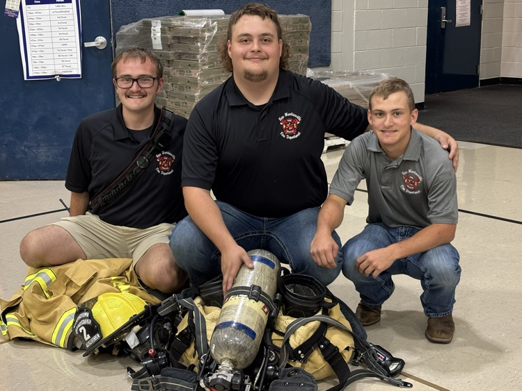old NMS students teach current eagles about fire safety 