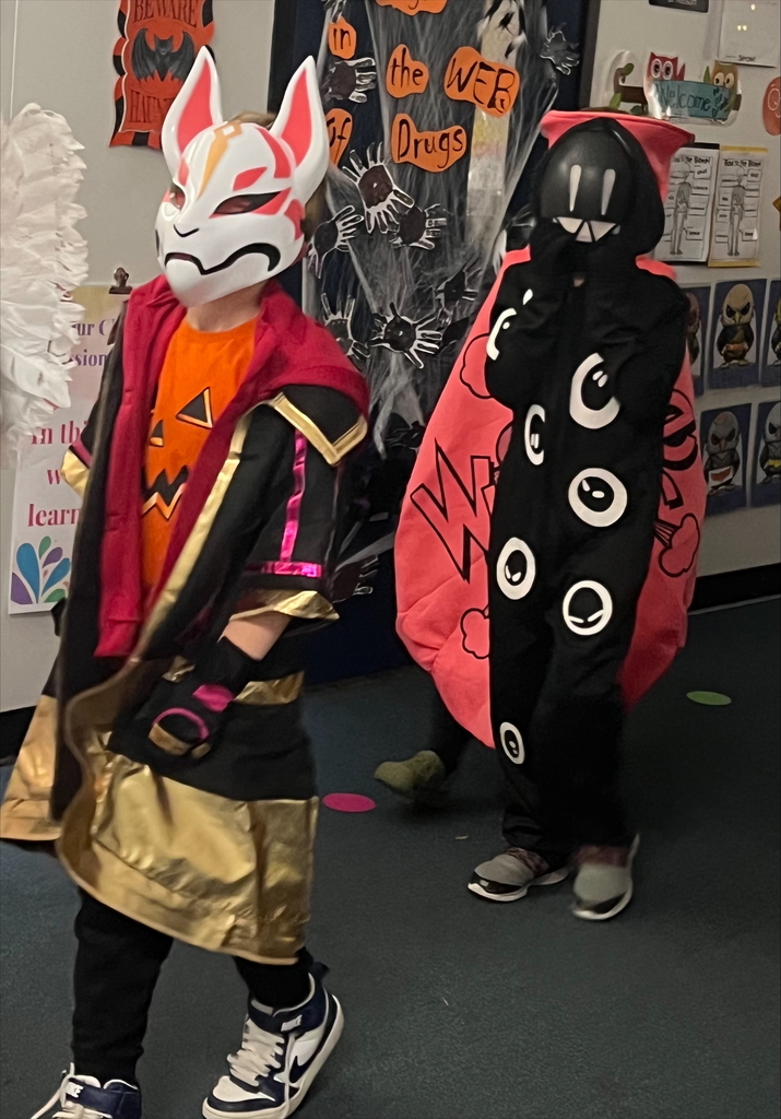The second graders entertained us with a Halloween 🎃 parade in costume today. Some were spooky, ☠️ some were bootiful, 👻 some were square, 👾 some were clowning around, 🤡 and some were protectors, 👮🏻but they were all adorably having a great time!