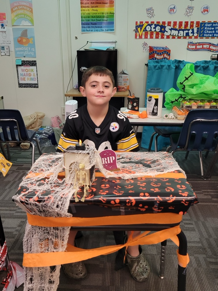 Student showing off their desk decorations. 