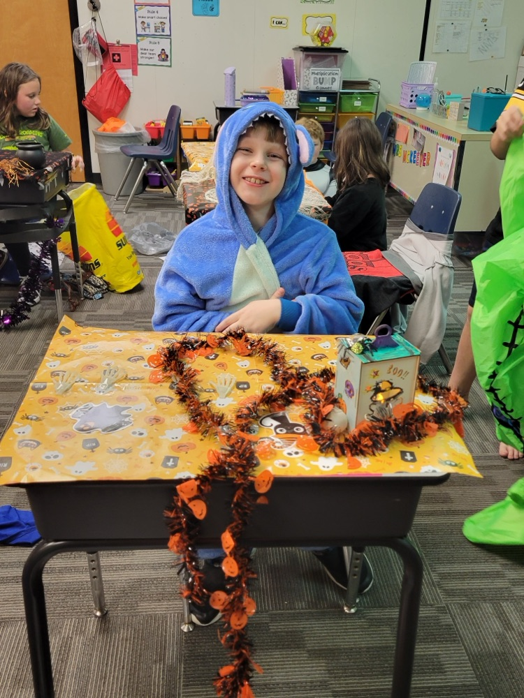 Student showing off their desk decorations. 