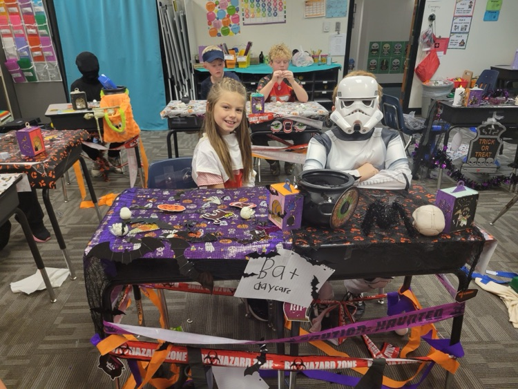 Students showing off their desk decorations. 