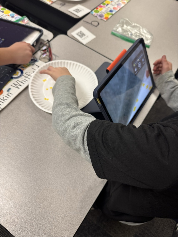 hand on the plate moving tiles 