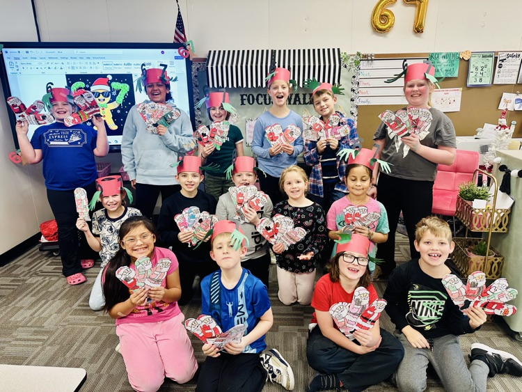 class holding the Christmas cards 