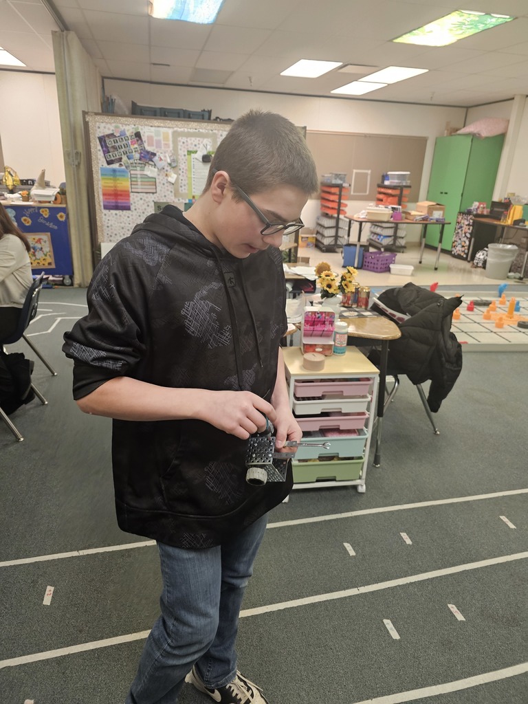 Students in Miss Landis's Project Lead the Way - Automation and Robotics class are learning to build and program systems to help people. Their project today was to create a cart that could be pulled on the back of a rescue bot to deliver supplies autonomous. Their prototypes had to be able to carry at least two blocks and had to contain a wheel. Students worked in teams to design their carts.