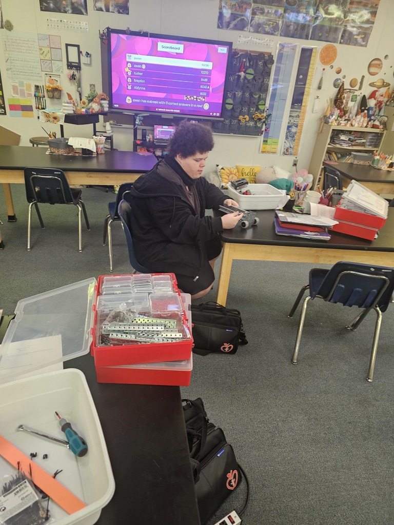 Students in Miss Landis's Project Lead the Way - Automation and Robotics class are learning to build and program systems to help people. Their project today was to create a cart that could be pulled on the back of a rescue bot to deliver supplies autonomous. Their prototypes had to be able to carry at least two blocks and had to contain a wheel. Students worked in teams to design their carts.