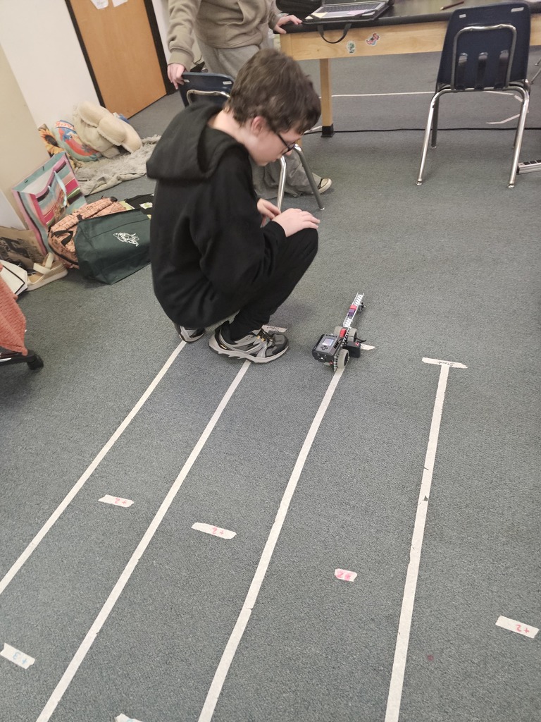 Students in Miss Landis's Project Lead the Way - Automation and Robotics class are learning to build and program systems to help people. Their project today was to create a cart that could be pulled on the back of a rescue bot to deliver supplies autonomous. Their prototypes had to be able to carry at least two blocks and had to contain a wheel. Students worked in teams to design their carts.