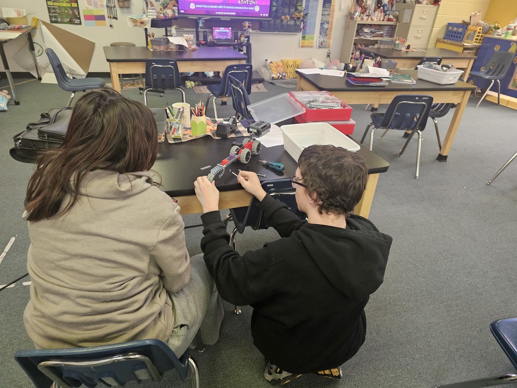 Students in Miss Landis's Project Lead the Way - Automation and Robotics class are learning to build and program systems to help people. Their project today was to create a cart that could be pulled on the back of a rescue bot to deliver supplies autonomous. Their prototypes had to be able to carry at least two blocks and had to contain a wheel. Students worked in teams to design their carts.