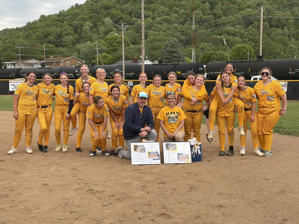 2026 Softaball Team in gold uniforms