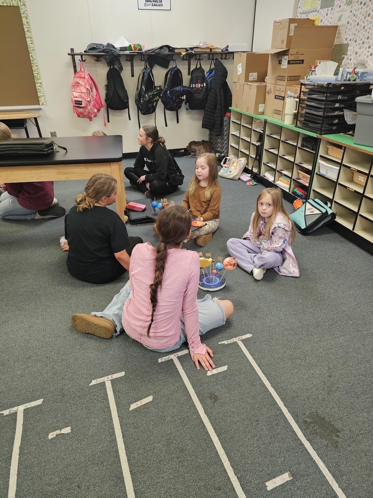 On May 7th, Mrs. Pilant's First Grade class came and visited Miss Landis's Sixth grade science class. On this special day, the first graders shared their Solar System projects with the sixth graders. The actively engaged in scientific exploration and discussions on the various planets in our solar system.