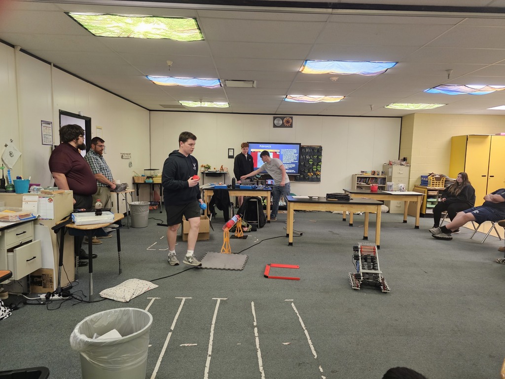 On May 5th, Mr. Yoho and Mr. Trimmer brought their VEX V5 team to New Martinsville School to meet with the New Martinsville Competitive Robotics teams. The high school students discussed the V5 robots and game with the middle schoolers. The New Martinsville student got a chance to see the V5 parts and drive the robot