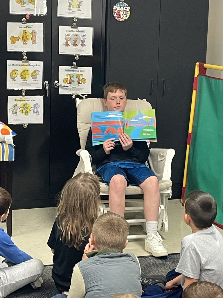 Reed Slider reading to the first grade students. 