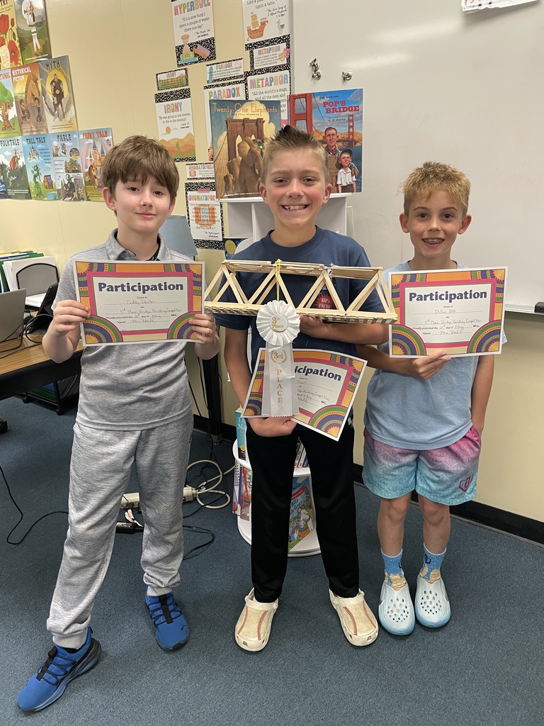 Tied for 3rd place Teddy Deuter, Chip Pilant & Dillon Utt  holding their bridge, certificates, and ribbon. 