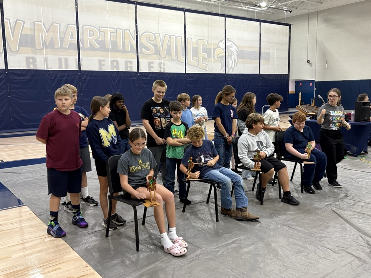 several student participating in presentation in the gym 
