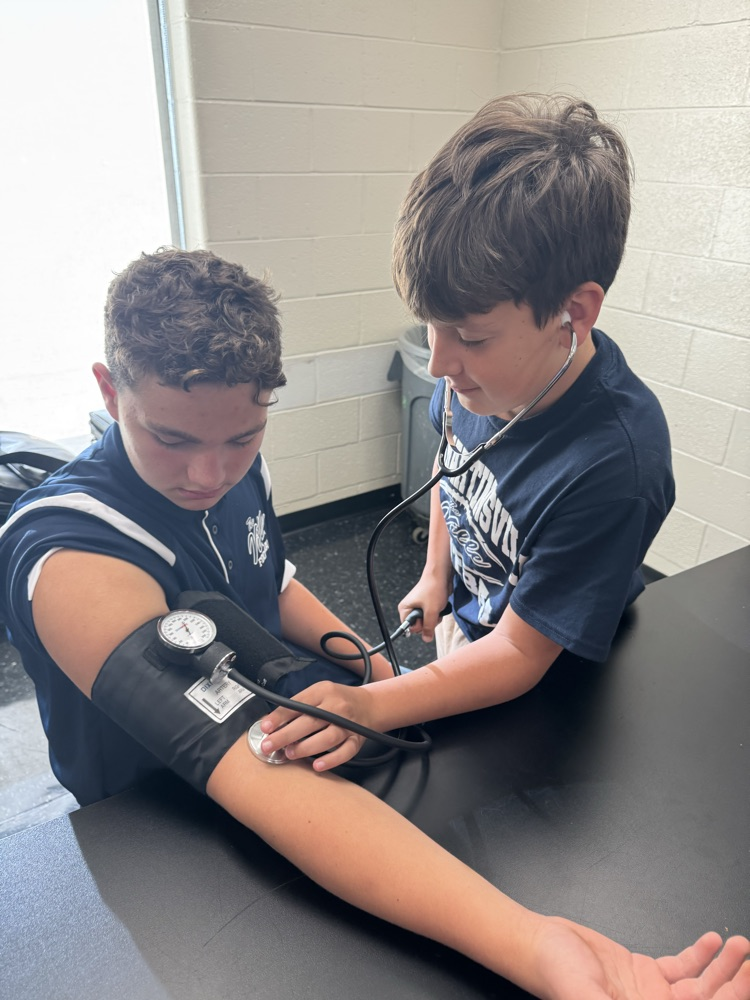 Titan Gump taking Garret Yoho’s blood pressure  