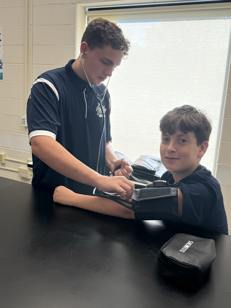 Garret Yoho takes Titan Gump’s blood pressure  
