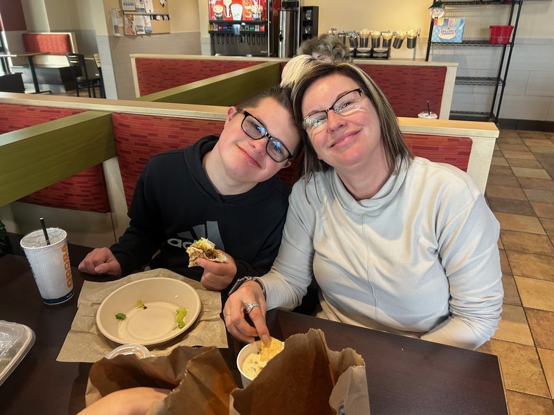 Mom and son smile for the camera