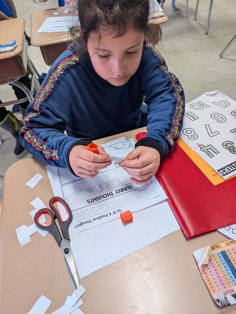 Student completing "sunny thoughts" activity for positive thinking ahead of state testing