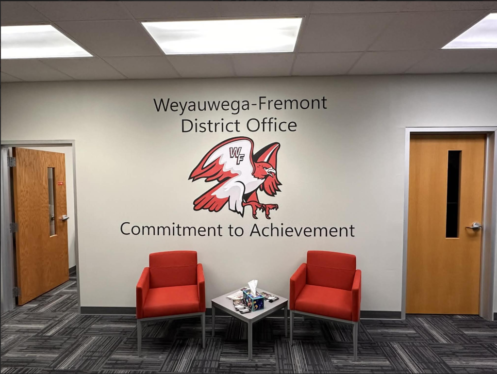 Completed Wega Manufacturing Project Displaying "Weyauwega-Fremont District Office Commitment to Achievement" 