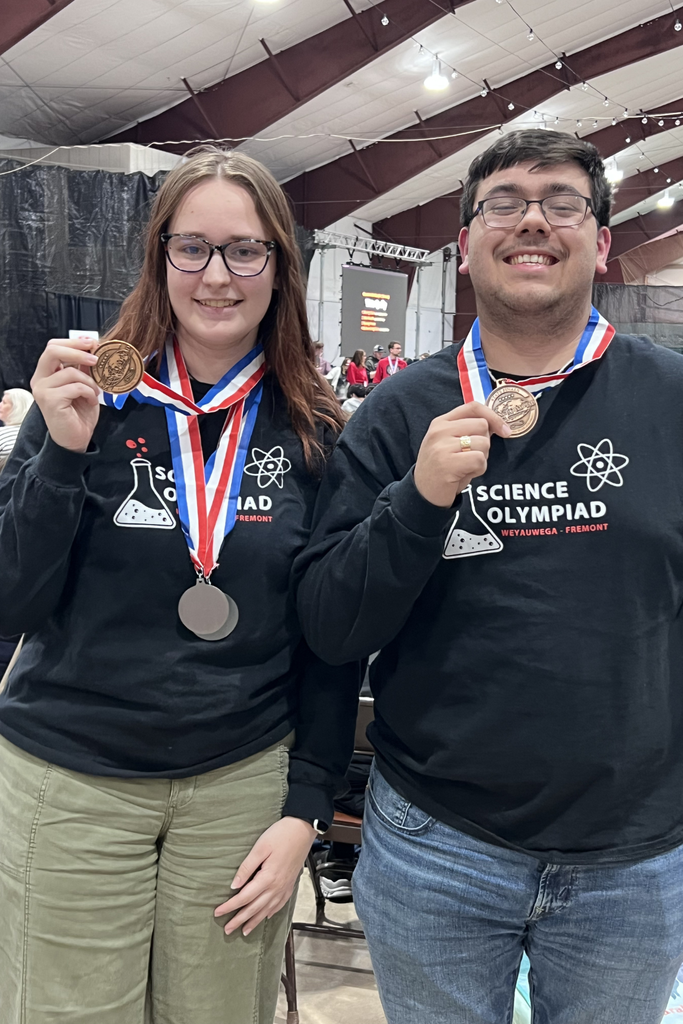 Science Olympiad Members Show Off Their Medals 