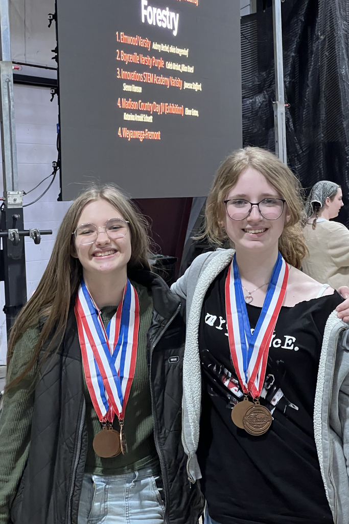 Science Olympiad Members Show Off Their Medals 