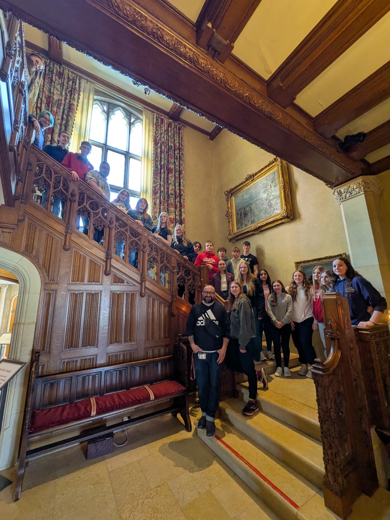 Students lining the staircase to take a big group photo at Paine Arts and Gardens Center