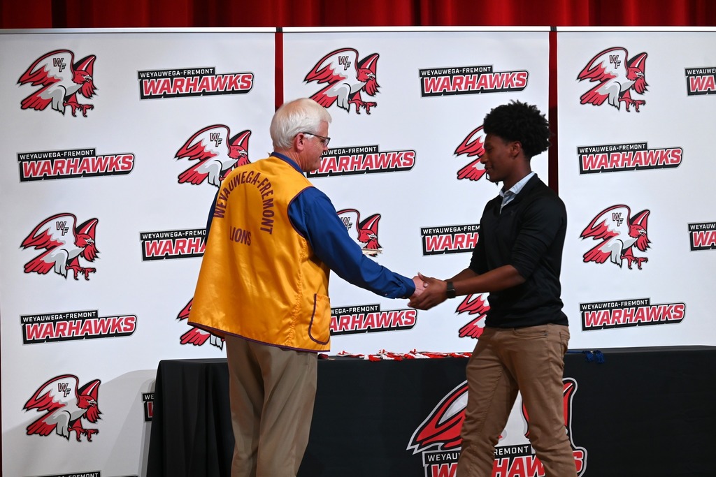 One of our seniors accepting his award